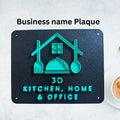 Black plaque with teal cut-out design and text on a light gray background wall 3d printed logo